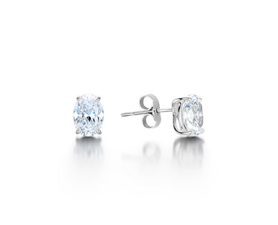 Oval Cut Four Claw Diamond Studs