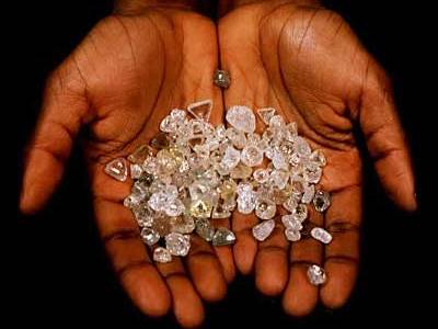 Rough Diamond in the hands of a small-scale miner