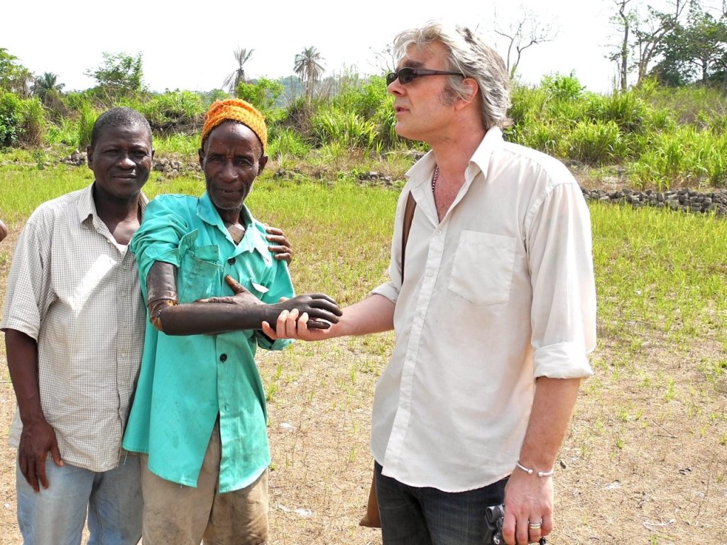 Shaking hands with a victim of conflict diamonds