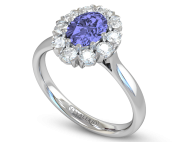 Oval Blue Sapphire and Diamond Cluster Engagement Ring