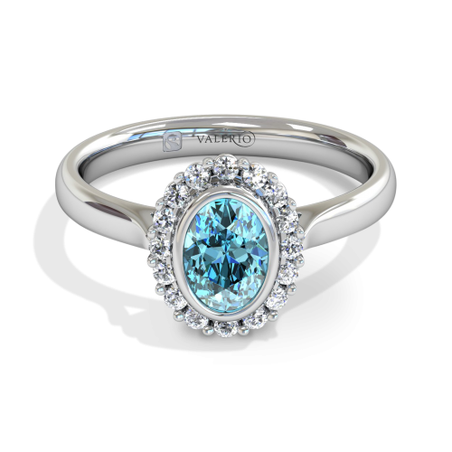 Oval Aquamarine and Diamond Cluster Engagement Ring
