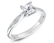 Solitaire Diamond Ring. Princess Cut Centre stone with diamonds on sides